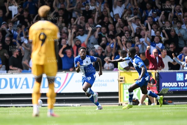 220826 - Bristol Rovers v Newport County - Sky Bet League 2 - Bobby Kamwa of Bristol Rovers celebrates scoring a goal and runs towards the Newport fans