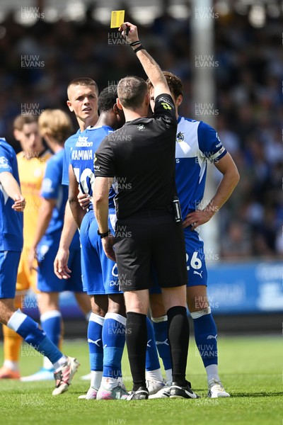 220826 - Bristol Rovers v Newport County - Sky Bet League 2 - Bobby Kamwa of Bristol Rovers is shown a yellow card