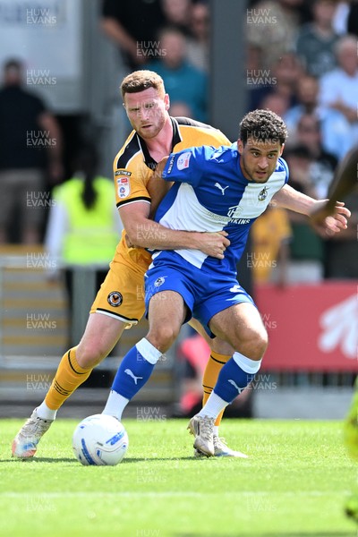 220826 - Bristol Rovers v Newport County - Sky Bet League 2 - Lee Jenkins of Newport County is challenged by Tom James of Bristol Rovers