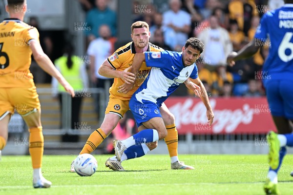 220826 - Bristol Rovers v Newport County - Sky Bet League 2 - Lee Jenkins of Newport County is challenged by Tom James of Bristol Rovers