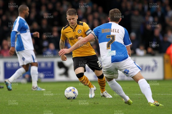 241015 - Bristol Rovers v Newport County - Sky Bet League 2 -Mark Byrne of Newport County takes on Lee Mansell of Bristol Rovers