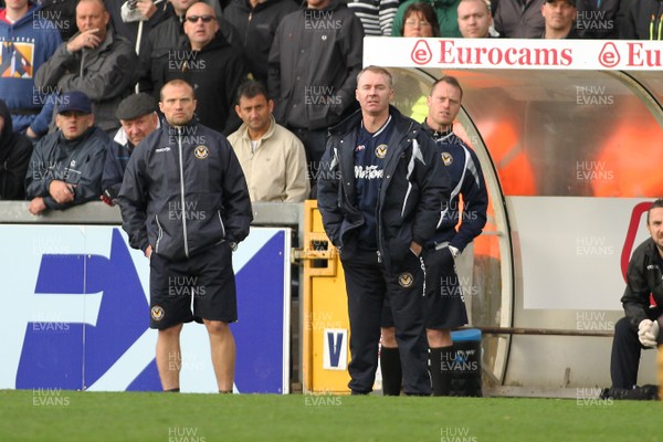 241015 - Bristol Rovers v Newport County - Sky Bet League 2 -Manager of Newport County John Sheridan is flanked by assistants Warren Feeney(L) and Michael Flynn