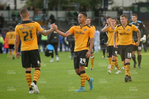 241015 - Bristol Rovers v Newport County - Sky Bet League 2 - Jazzi Barnum Bobb of Newport County celebrates with Matthew Partridge after the final whistle