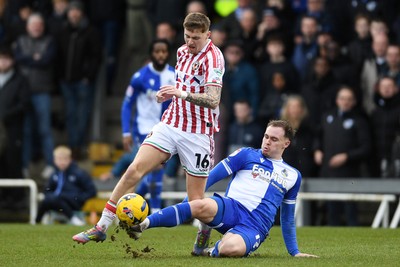 310126 - Bristol Rovers v Newport County - Sky Bet League 2 - James Crole of Newport County is challenged by Kofi Balmer of Bristol Rovers