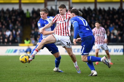 310126 - Bristol Rovers v Newport County - Sky Bet League 2 - James Crole of Newport County is challenged by Kofi Balmer of Bristol Rovers