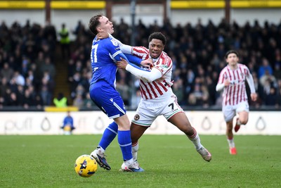 310126 - Bristol Rovers v Newport County - Sky Bet League 2 - Bobby Kamwa of Newport County is challenged by Kofi Balmer of Bristol Rovers