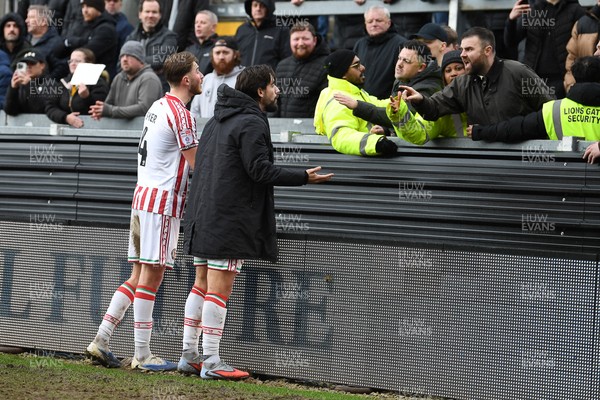 310126 - Bristol Rovers v Newport County - Sky Bet League 2 - Things heat up between Matthew Baker of Newport County, Liam Shepard of Newport County and Newport fans at full time