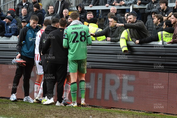 310126 - Bristol Rovers v Newport County - Sky Bet League 2 - Things heat up between Matthew Baker of Newport County, Liam Shepard of Newport County and Newport fans at full time