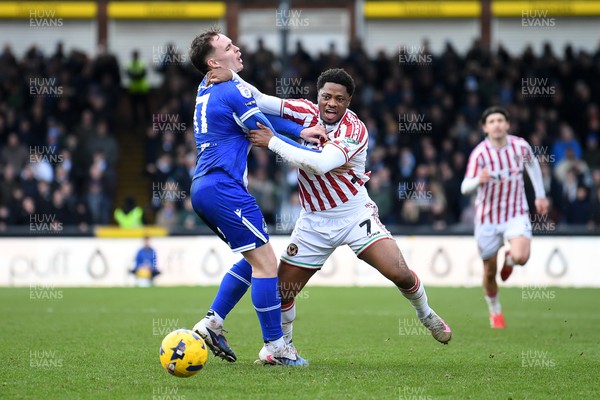 310126 - Bristol Rovers v Newport County - Sky Bet League 2 - Bobby Kamwa of Newport County is challenged by Kofi Balmer of Bristol Rovers