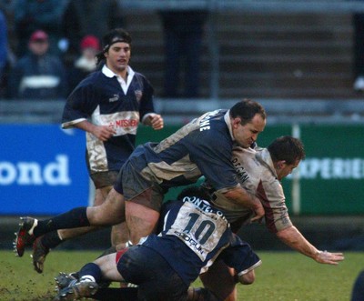 020203 - Bristol v Leeds - Zurich Premiership - Bristol's Paul Johnstone and Felipe Contepomi (10) take down Leeds Hooker Mark Regan 