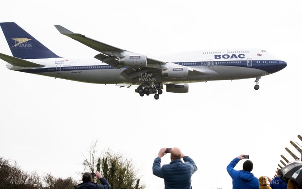 111220 -  Members of the public look on as British Airways specially painted 747 G-BYGC landing at St Athan, South Wales where it is reported to be maintained as a heritage piece
