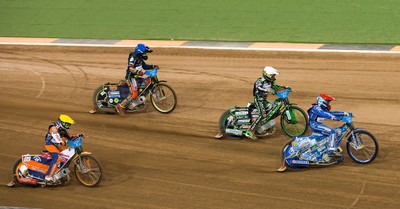 210718 - British FIM Speedway Grand Prix, Cardiff - Riders make their way around the track at the British FIM Speedway Grand Prix