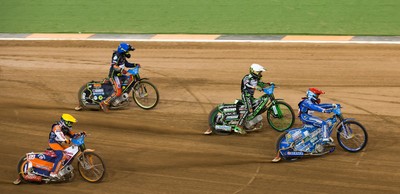 210718 - British FIM Speedway Grand Prix, Cardiff - Riders make their way around the track at the British FIM Speedway Grand Prix