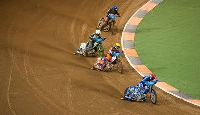 210718 - British FIM Speedway Grand Prix, Cardiff - Riders make their way around the track at the British FIM Speedway Grand Prix