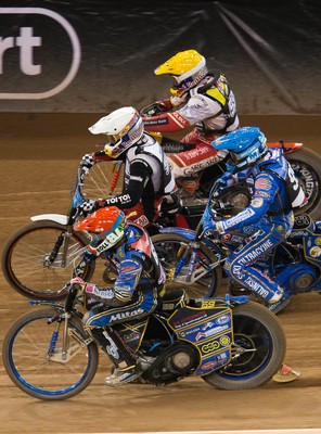 210718 - British FIM Speedway Grand Prix, Cardiff - Riders make their way around the track during the heats at the British FIM Speedway Grand Prix