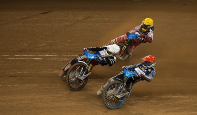 210718 - British FIM Speedway Grand Prix, Cardiff - Riders make their way around the track during the heats at the British FIM Speedway Grand Prix