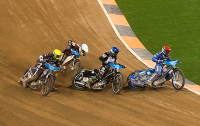 210718 - British FIM Speedway Grand Prix, Cardiff - Bartosz Zmarzlik from Poland, right, leads Tai Woffinden of Great Britain to win the British FIM Speedway Grand Prix