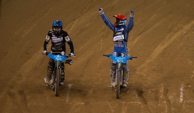 210718 - British FIM Speedway Grand Prix, Cardiff - Bartosz Zmarzlik from Poland celebrates alongside Tai Woffinden of Great Britain after winning the British FIM Speedway Grand Prix