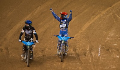 210718 - British FIM Speedway Grand Prix, Cardiff - Bartosz Zmarzlik from Poland celebrates alongside Tai Woffinden of Great Britain after winning the British FIM Speedway Grand Prix