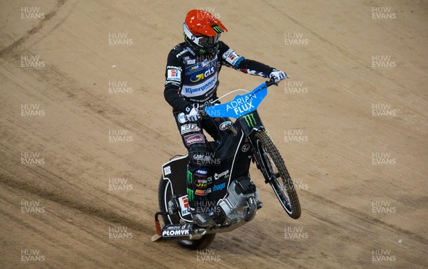 210718 - British FIM Speedway Grand Prix, Cardiff - Tai Woffinden of Great Britain wheelies as he makes his way to the start line