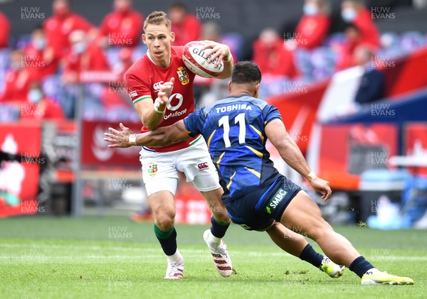 260621 - British & Irish Lions v Japan - The Vodafone 1888 Cup - Liam Williams of British & Irish Lions is tackled by Siosaia Fifita of Japan