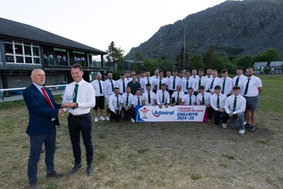 170525 - Bro Ffestiniog RFC, Admiral National League 3 North West Presentation - Alun Roberts, WRU North Wales representative presents Bro Ffestiniog RFC captain Huw Parry with the trophy after they win the Admiral National League 3 North West title