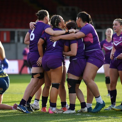 220426 - Brunel v Loughborough - Women's BUCS Final - Amelia Williams of Loughborough celebrates scoring a try with team mates