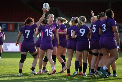 220426 - Brunel v Loughborough - Women's BUCS Final - Amelia Williams of Loughborough celebrates scoring a try with team mates