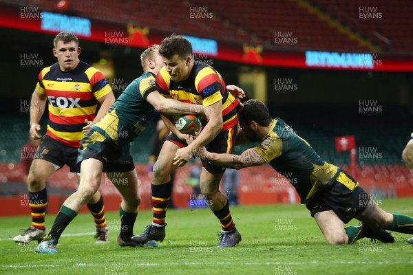 290418 - Brynmawr RFC v Nant Conwy RFC - WRU National Plate Competition - Final - Joshua Congreve of Brynmawr is tackled by Jack Moriarty(L) and Carwyn Ellis of Nant Conwy 