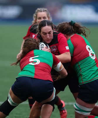 110126 - Brython Thunder v  Clovers, Celtic Challenge - Courtney Keight of Brython Thunder is tackled by Jane Clohessy of Clovers and Jemima Adams Verling of Clovers