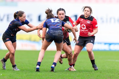 140226 - Brython Thunder v Edinburgh - Celtic Challenge - Jorja Aiono of Brython Thunder takes on Hannah Ramsay of Edinburgh