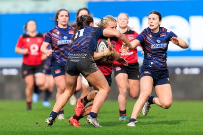 140226 - Brython Thunder v Edinburgh - Celtic Challenge - Seren Singleton of Brython Thunder is tackled high by Hannah Walker of Edinburgh leading to a yellow card and a penalty try