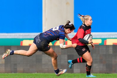 140226 - Brython Thunder v Edinburgh - Celtic Challenge - Savannah Picton-Powell of Brython Thunder is tackled by Rachel Philipps of Edinburgh