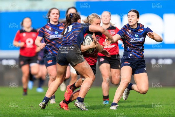 140226 - Brython Thunder v Edinburgh - Celtic Challenge - Seren Singleton of Brython Thunder is tackled high by Hannah Walker of Edinburgh leading to a yellow card and a penalty try