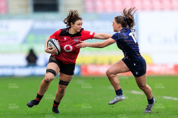 140226 - Brython Thunder v Edinburgh - Celtic Challenge - Branwen Metcalfe of Brython Thunder hands off Hannah Walker of Edinburgh