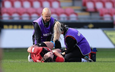 090325  Brython Thunder v Glasgow Warriors, Celtic Challenge - Cadi Lois Davies of Brython Thunder receives treatment for an injury before being stretchered off