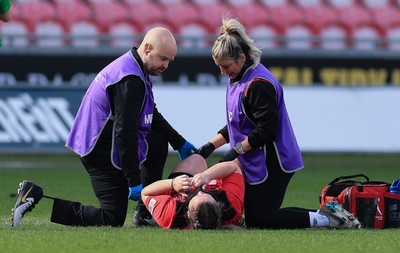 090325  Brython Thunder v Glasgow Warriors, Celtic Challenge - Cadi Lois Davies of Brython Thunder receives treatment for an injury before being stretchered off