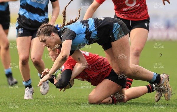 090325  Brython Thunder v Glasgow Warriors, Celtic Challenge - Meg Webb of Brython Thunder and Orla Proctor of Glasgow Warriors compete for the ball