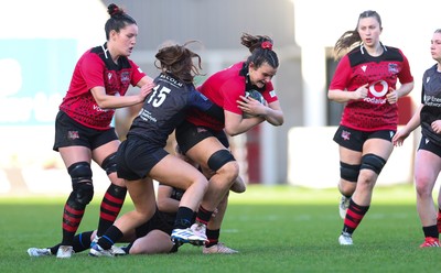 201225 - Brython Thunder v Glasgow Warriors, Celtic Challenge - Branwen Metcalfe of Brython Thunder is held