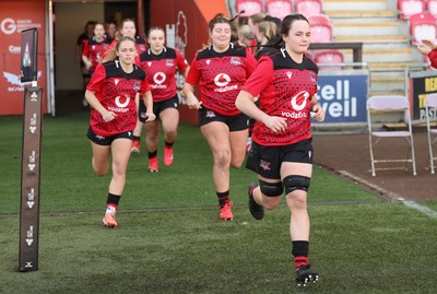 201225 - Brython Thunder v Glasgow Warriors, Celtic Challenge - Jess Rogers leads as Brython Thunder run out at the start of the match