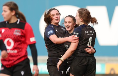 201225 - Brython Thunder v Glasgow Warriors, Celtic Challenge - Hannah Smyth of Glasgow Warriors celebrates with team mates after she scores her second try