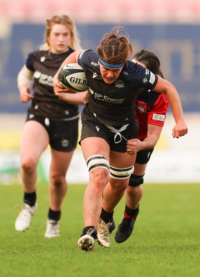 201225 - Brython Thunder v Glasgow Warriors, Celtic Challenge - Gemma Bell is held by Jess Rogers of Brython Thunder