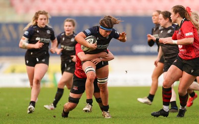 201225 - Brython Thunder v Glasgow Warriors, Celtic Challenge - Gemma Bell is held by Jess Rogers of Brython Thunder