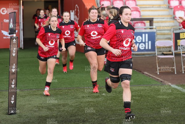 201225 - Brython Thunder v Glasgow Warriors, Celtic Challenge - Jess Rogers leads as Brython Thunder run out at the start of the match
