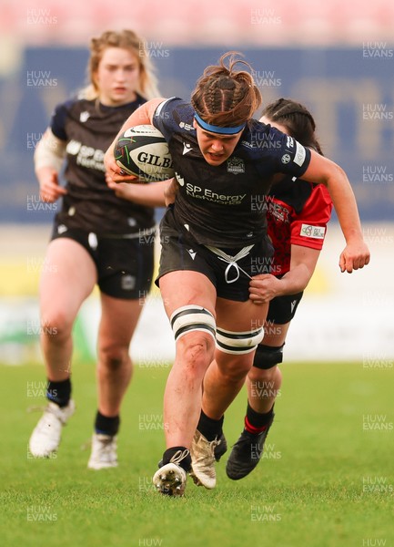 201225 - Brython Thunder v Glasgow Warriors, Celtic Challenge - Gemma Bell is held by Jess Rogers of Brython Thunder