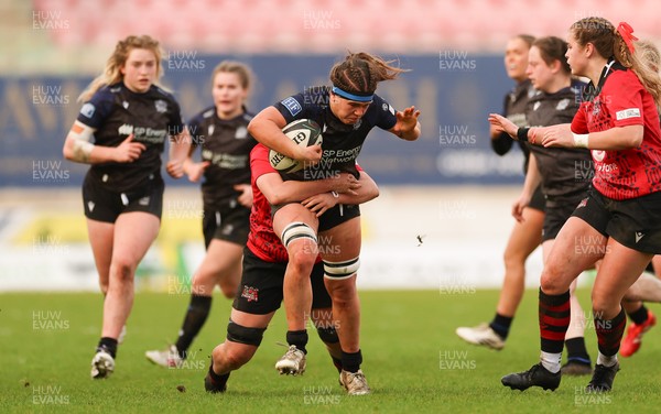 201225 - Brython Thunder v Glasgow Warriors, Celtic Challenge - Gemma Bell is held by Jess Rogers of Brython Thunder