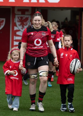 080326 - Brython Thunder v Gwalia Lightning, Celtic Challenge - Gwen Crabb of Brython Thunder leads the team out with  mascots