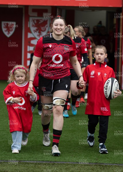 080326 - Brython Thunder v Gwalia Lightning, Celtic Challenge - Gwen Crabb of Brython Thunder leads the team out with  mascots