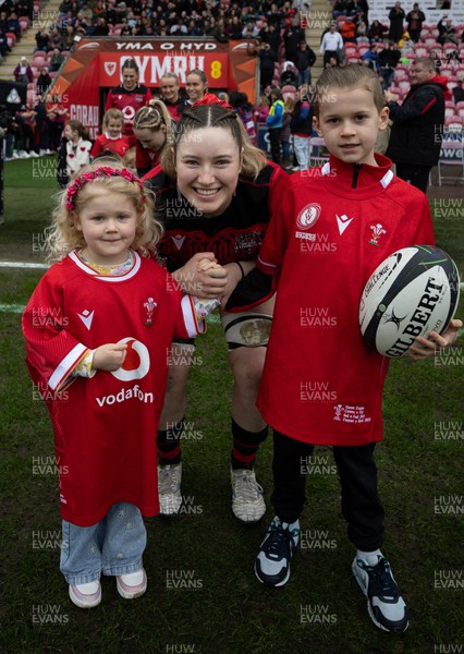 080326 - Brython Thunder v Gwalia Lightning, Celtic Challenge - Gwen Crabb of Brython Thunder with match mascots