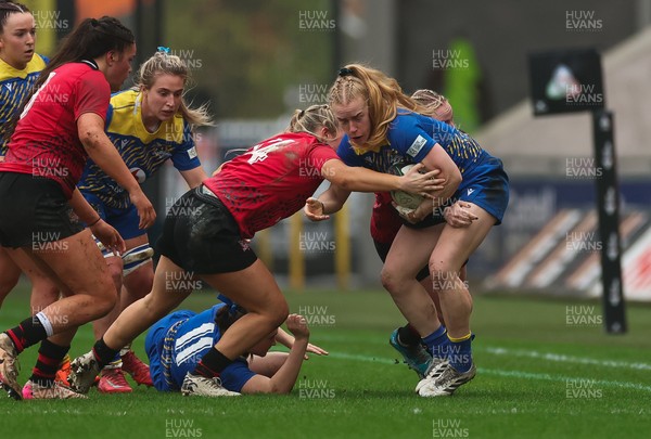 080326 - Brython Thunder v Gwalia Lightning, Celtic Challenge - Catherine Richards of Gwalia Lightning is held